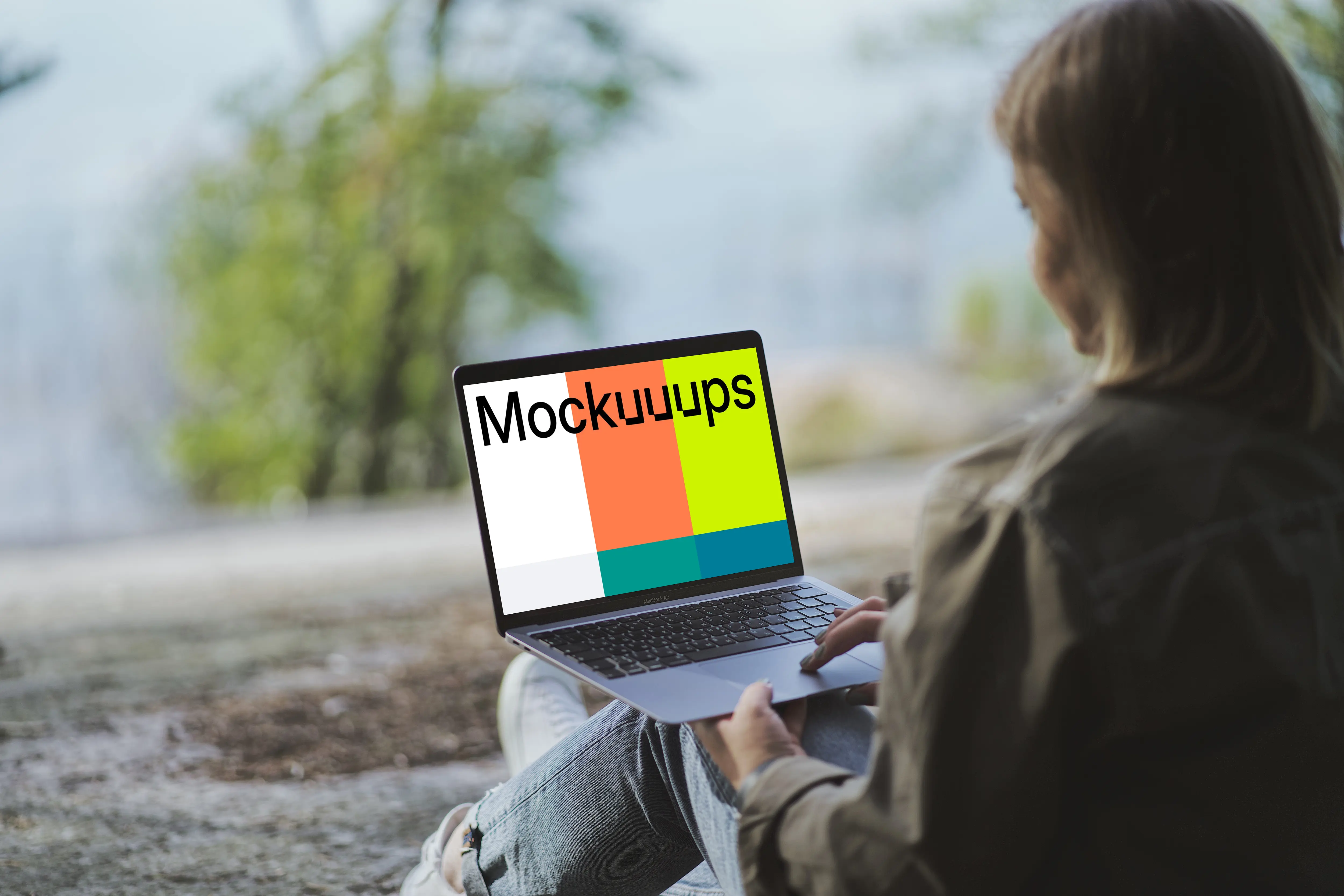 Young woman reading on MacBook Air mockup