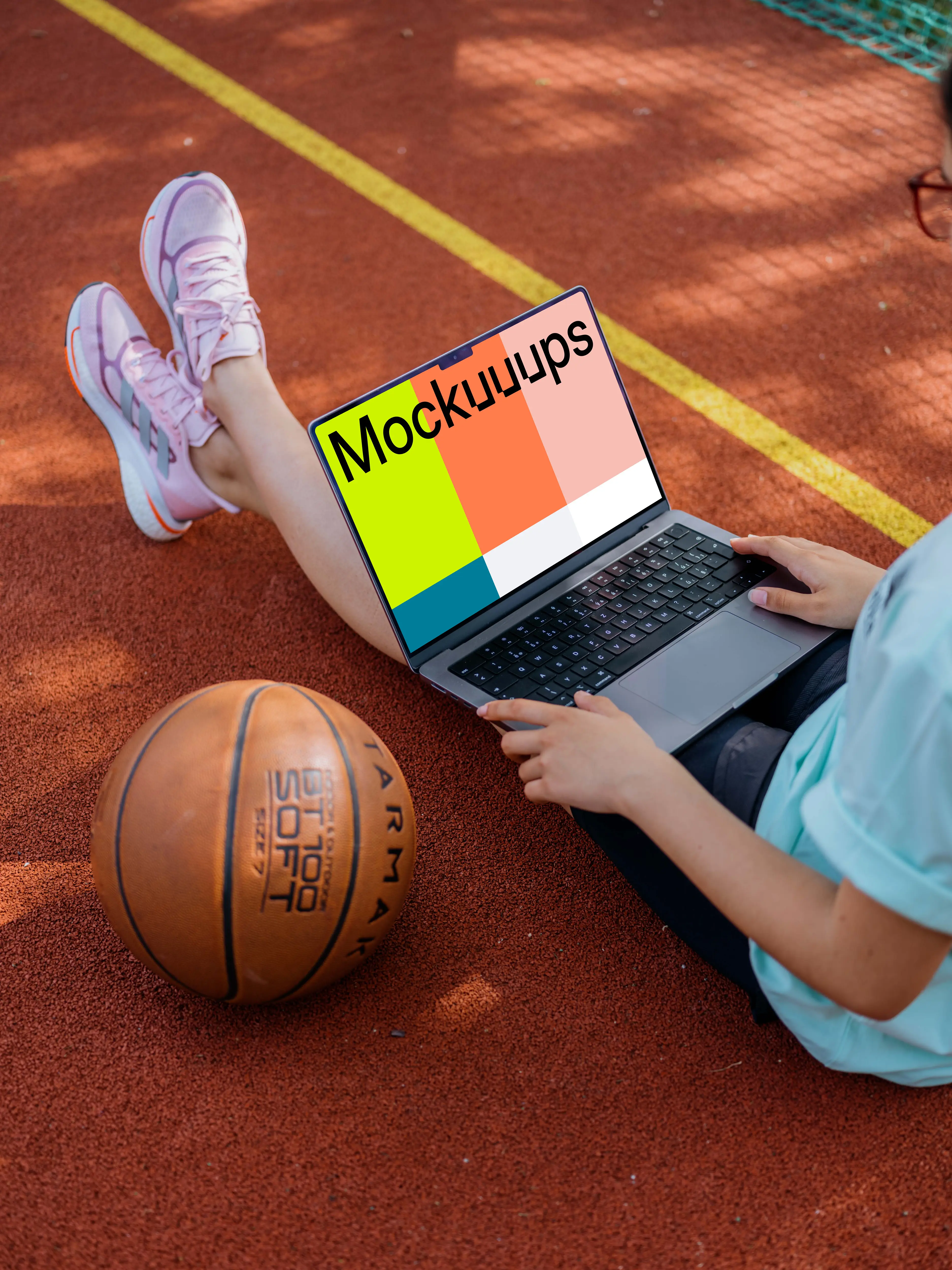 Young woman working on a MacBook Pro mockup