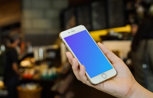 Holding iPhone 6 Gold mockup
