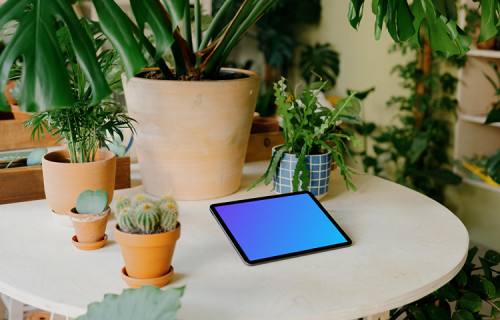 iPad mockup on a roundtable in a garden