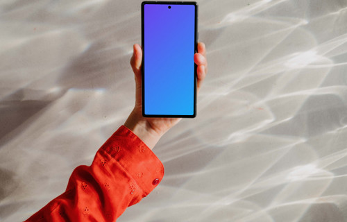 Google Pixel 6 mockup held by a user against a bright background