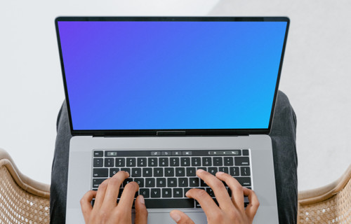 MacBook mockup held in user’s laps