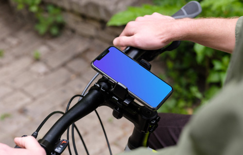Standing on a bike with iPhone 11 Pro mockup in bike mount