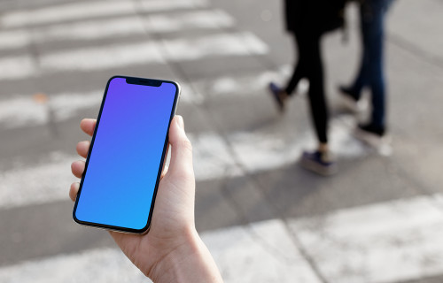 Crossing street with iPhone X mockup