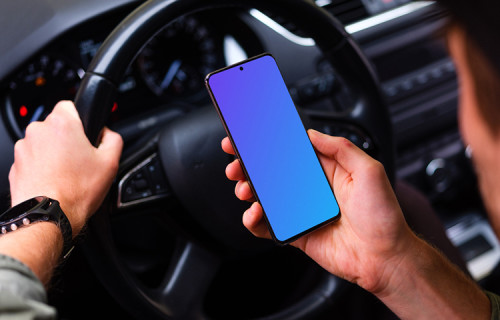 Driver parked up viewing Samsung S20 mockup at the wheel