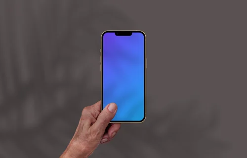 Hand holding smartphone mockup