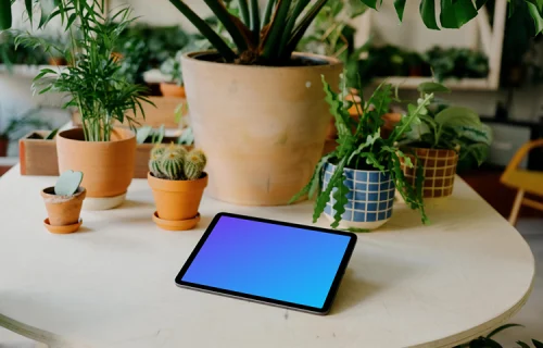 iPad mockup on a white round table