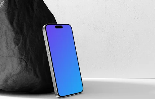 iPhone 15 Pro encostado em uma rocha Mockup