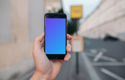 iPhone 6 mockup in front of a Taxi stand