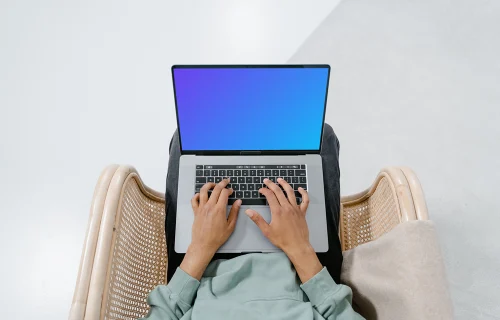 MacBook mockup on a user's laps