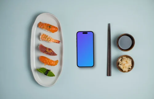 Nigiri sushi sur une assiette à côté du Smartphone mockup