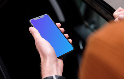 Pasajero entrando en un coche con un iPhone 11 en la mano mockup