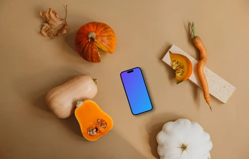 Phone mockup next to vegetables