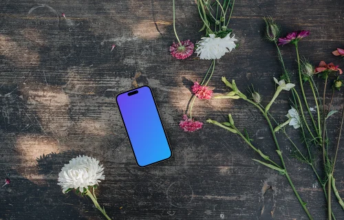 Phone mockup surrounded by flowers