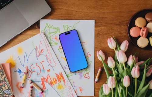 Phone placed on scratched papers for Mother's Day