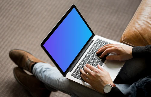 Sitting and typing on Macbook Pro mockup