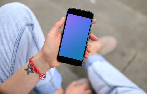 Sitting on stairs with iPhone 6 mockup