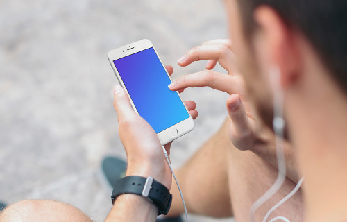 Sitting on Stairs with iPhone 6s mockup and Headphones