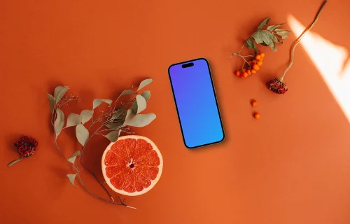 Smartphone mockup on vivid orange background