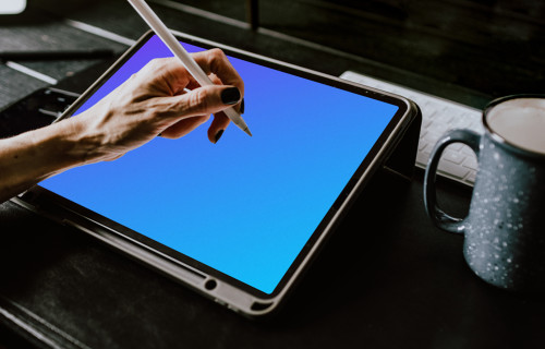 Tablet mockup on a work desk