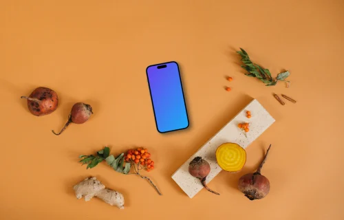 Top view of smartphone mockup on the orange background