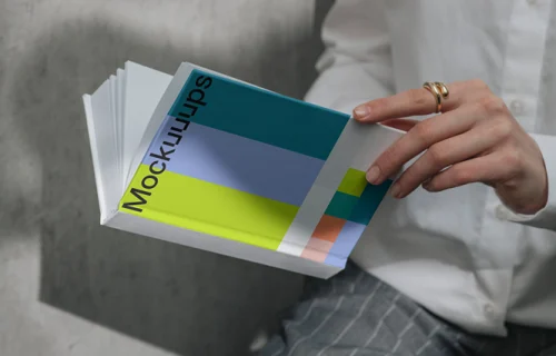 A-format book mockup in a casual setting