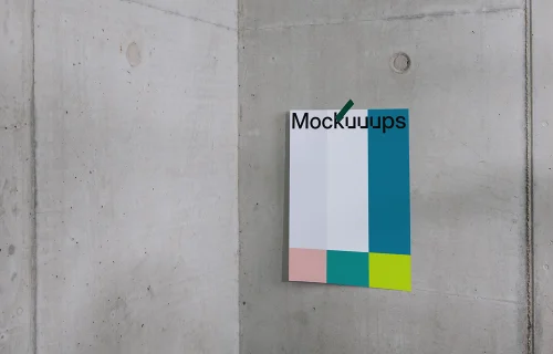 A3 mockup on a concrete wall with tape