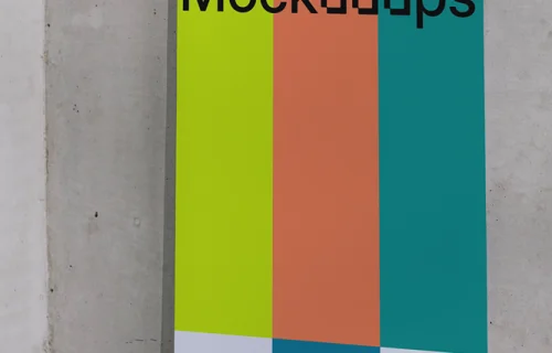 A3 mockup taped to a concrete wall