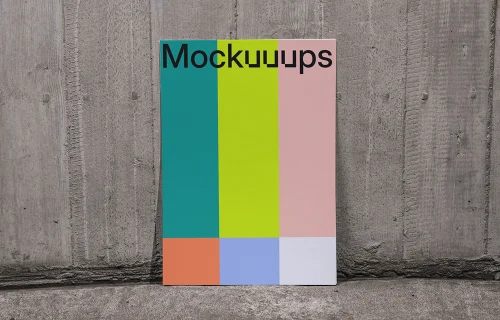 A4 mockup against a concrete wall