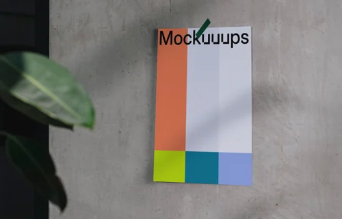 A4 mockup on a concrete wall with natural shadows