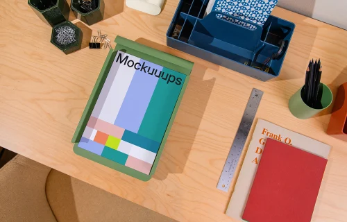 A4 paper mockup on a wooden desk with office supplies