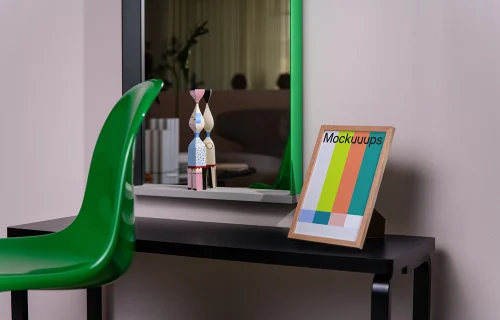 A5 frame mockup on a black desk with decor and mirror