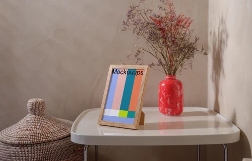 A5 frame mockup on a modern table with decorative elements