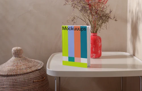 B-format book mockup on a modern side table