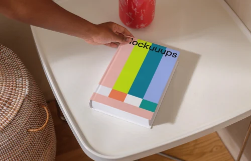 B-format book mockup on a modern white table