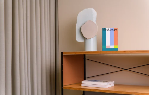 B-format book mockup on a modern wooden shelf