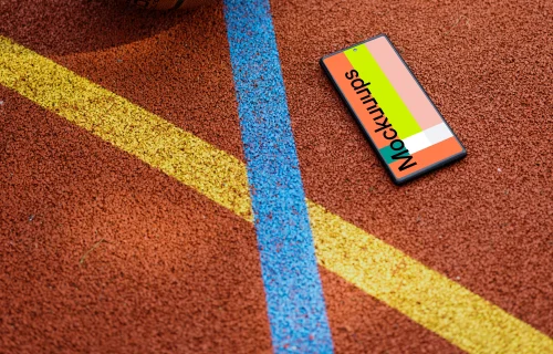 Basketball player standing next to a Google Pixel 6 mockup