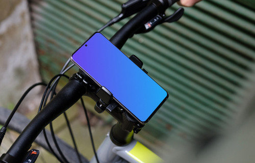 Bike next to a garage door with Samsung S20 mockup in bike mount