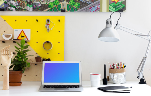 Bright office environment mockup with MacBook Air
