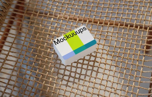 Business card mockup on a woven chair
