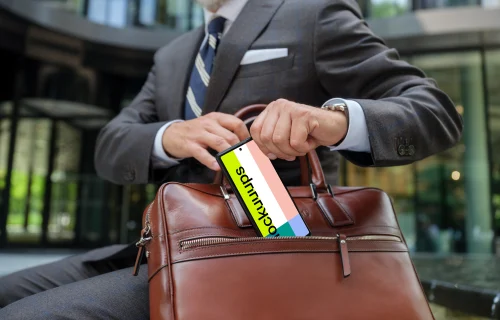 Businessman holding a Google Pixel mockup