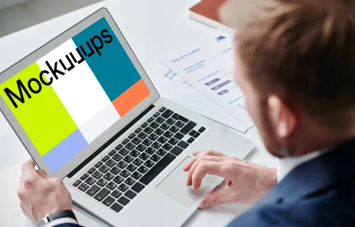 Businessman using an MacBook Air mockup