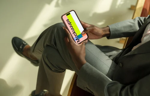 Businesswoman typing on the iPhone 14 Pro mockup