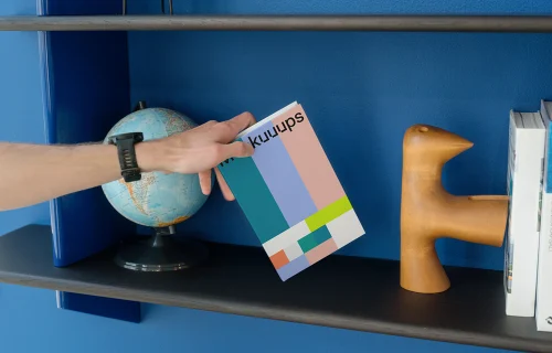 C-format book mockup on a stylish bookshelf
