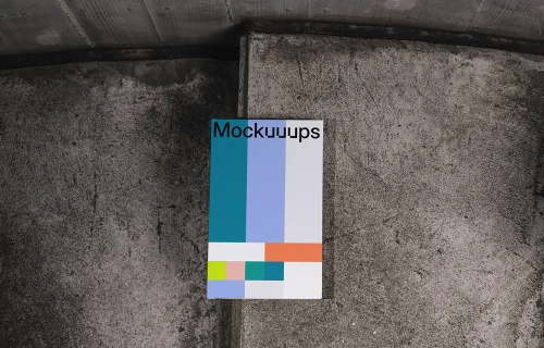 C-format book mockup on textured concrete background