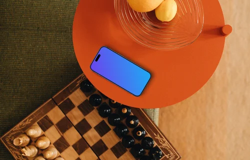 Chess board next to the iPhone mockup