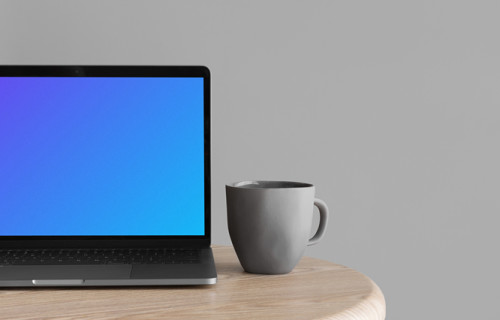Cropped view of Macbook Pro mockup on wooden table