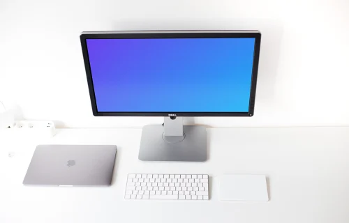Display mockup with closed Macbook Pro