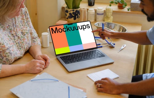 Doctor pointing to MacBook Pro 14" mockup