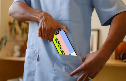 Doctor with the iPhone 14 Pro mockup